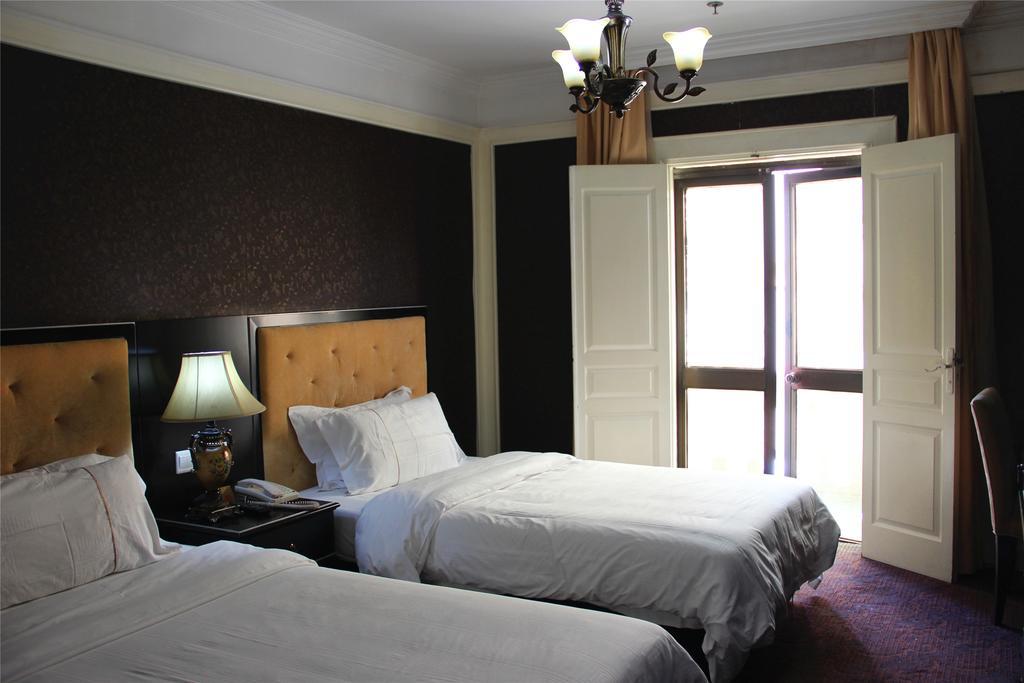 Manhattan Jinling Hotel Şanghay Oda fotoğraf