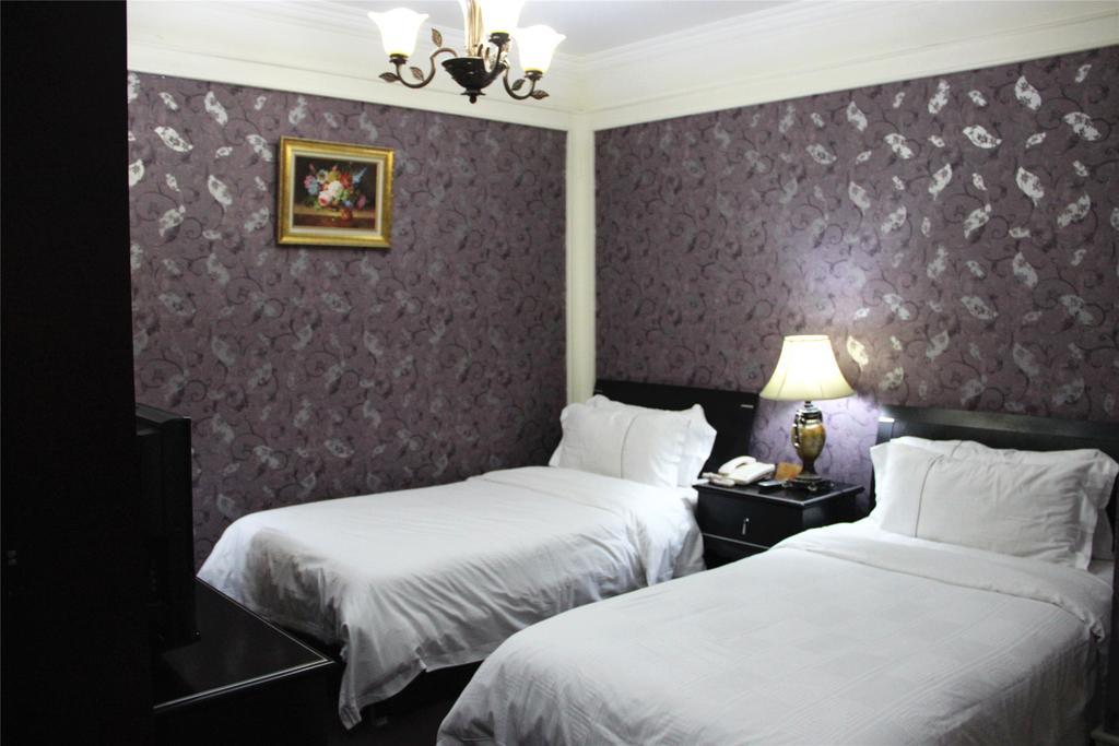 Manhattan Jinling Hotel Şanghay Oda fotoğraf